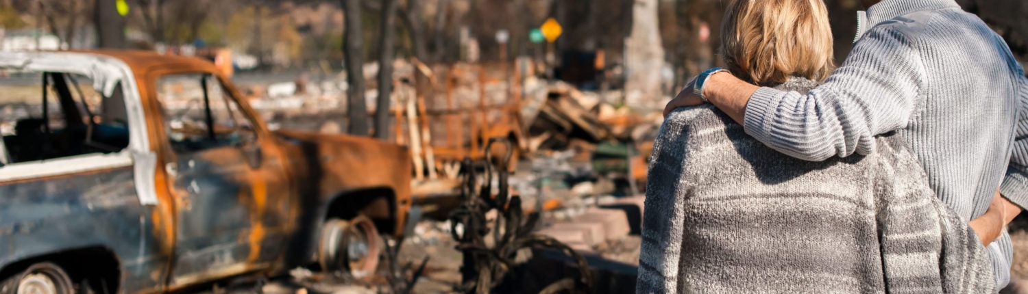 Couple Assessing Damage